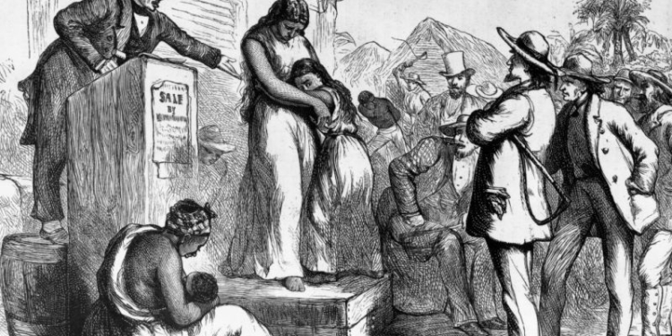 circa 1830:  A slave auction in America.  (Photo by Rischgitz/Getty Images)