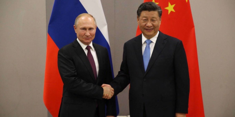 BRASILIA, BRAZIL - NOVEMBER,13, (RUSSIA OUT) Russian President Vladimir Putin (L) greets Chinese President Xi Jinping (R) during their bilateral meeting in Brasilia, Brazil, November,13,2019. Leaders of Russia, China, Brazil, India and South Africa have gateheres in Brasila for the BRICS Leaders Summit. (Photo by Mikhail Svetlov/Getty Images)
