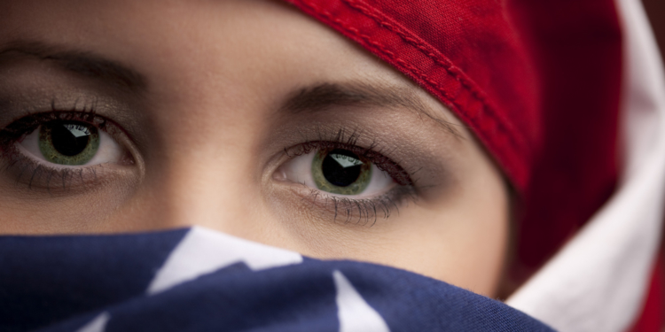 Woman wrapped in an American Flag